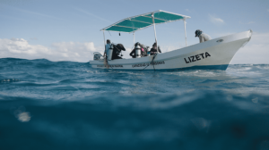 Dive boat with Takata divers preparing to enter the water